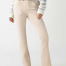 A person wearing beige velveteen Hayden bootcut pants from Sanctuary Clothing, a light gray and white striped sweater, and toasted almond ankle boots. The image is focused on the lower half of the body, with hands partially visible in the sweater sleeves.