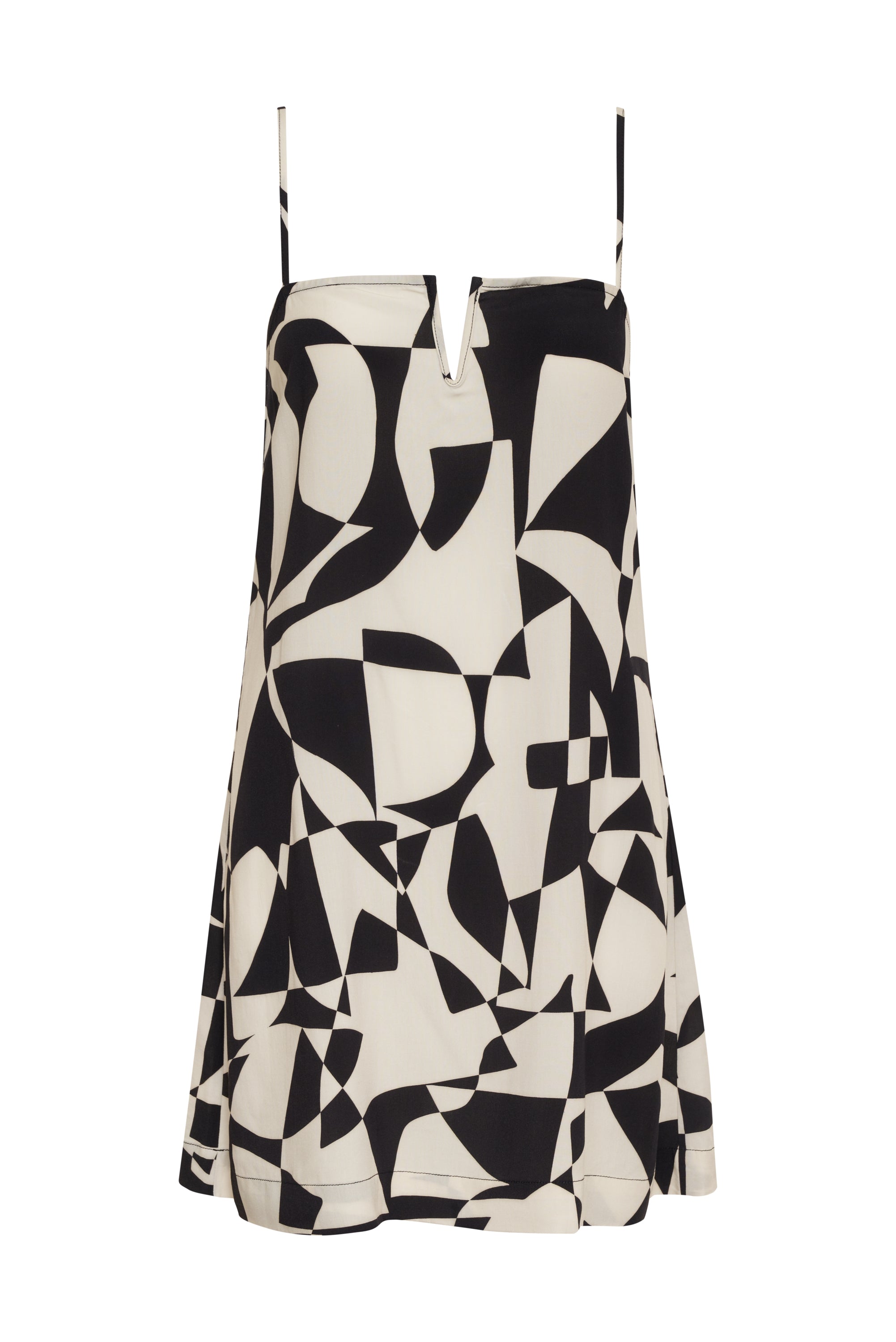 Introducing the Abstract Island Dress in White Sand by Sanctuary Clothing. This sleeveless black and white dress features a striking geometric print with abstract shapes for a modern, artistic appeal. Designed with a V-cut neckline, it also boasts thin, adjustable spaghetti straps for added comfort and a relaxed fit for effortless style.