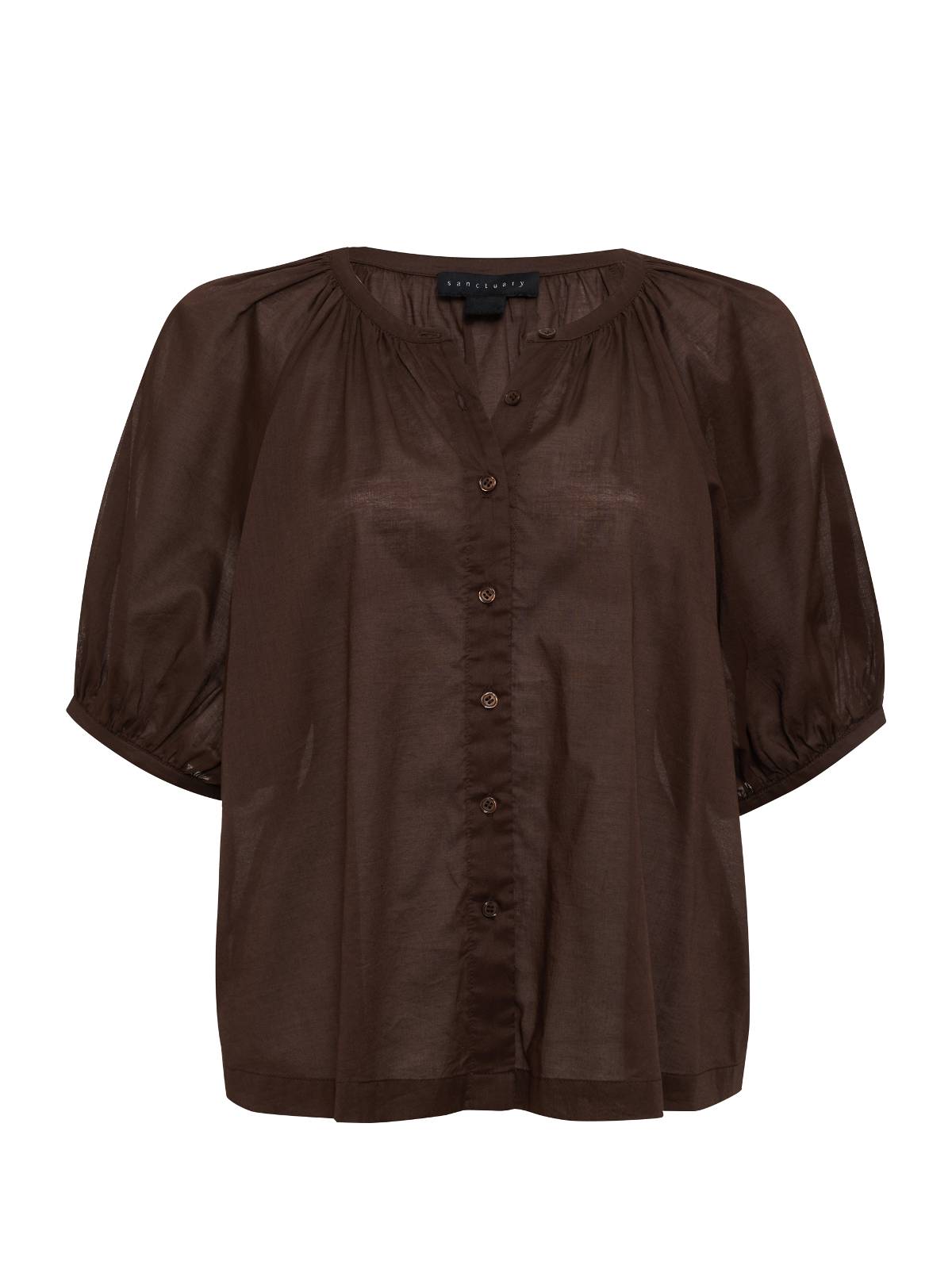 The Bubble Sleeve Boho Blouse Mud Bath by Sanctuary Clothing is a brown button-up blouse with short, puffed sleeves and a round neckline. It's made from a lightweight, semi-sheer fabric and features a gathered yoke detail along with a slightly loose fit.