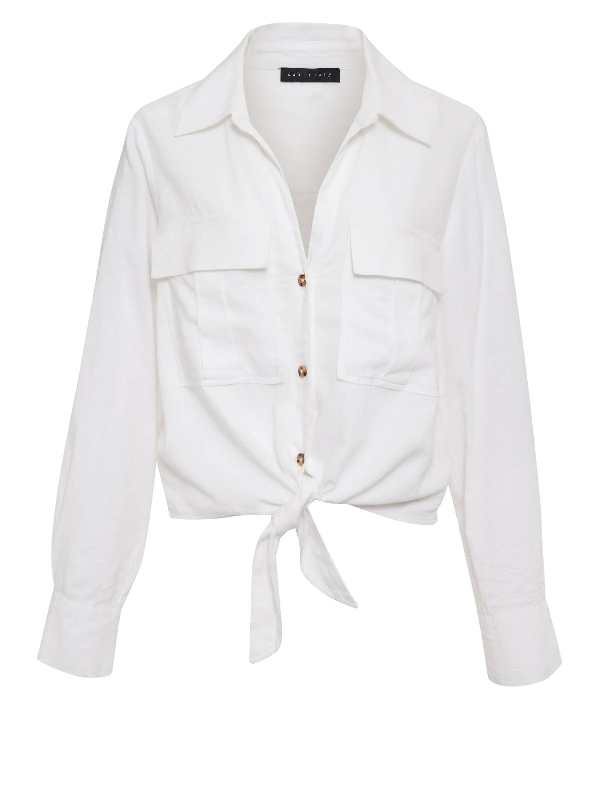 The Utility Pocket Shirt White by Sanctuary Clothing is a long-sleeved blouse featuring two chest pockets and a front tie at the waist. It comes with a collar and fastens down the front with three visible brown buttons, made from light, breathable fabric that’s perfect for casual wear.