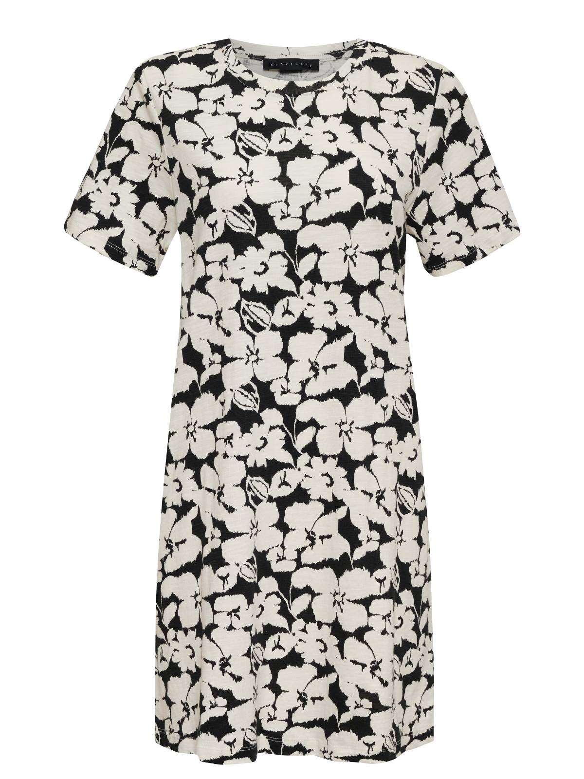 The Only One T Shirt Dress Echo Blooms from the Inclusive Collection by Sanctuary Clothing is a short-sleeve, knee-length dress featuring a round neckline and a relaxed, straight fit. Its black background is adorned with an array of white flowers, creating a bold and contrasting design.