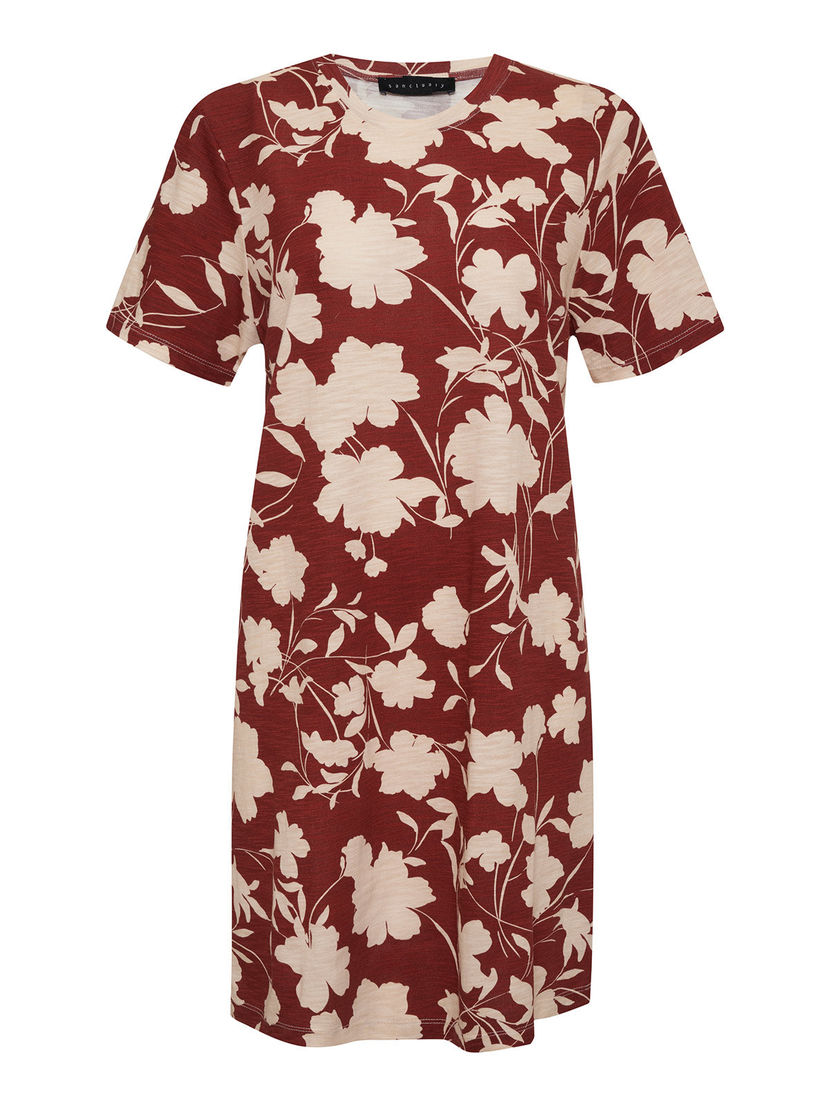 The Only One T Shirt Dress Warm Vista Inclusive Collection by Sanctuary Clothing is a short-sleeved, knee-length dress with a maroon base featuring a prominent cream-colored floral pattern. It has a simple, round neckline and offers a straight, relaxed fit that makes it perfect for casual wear.