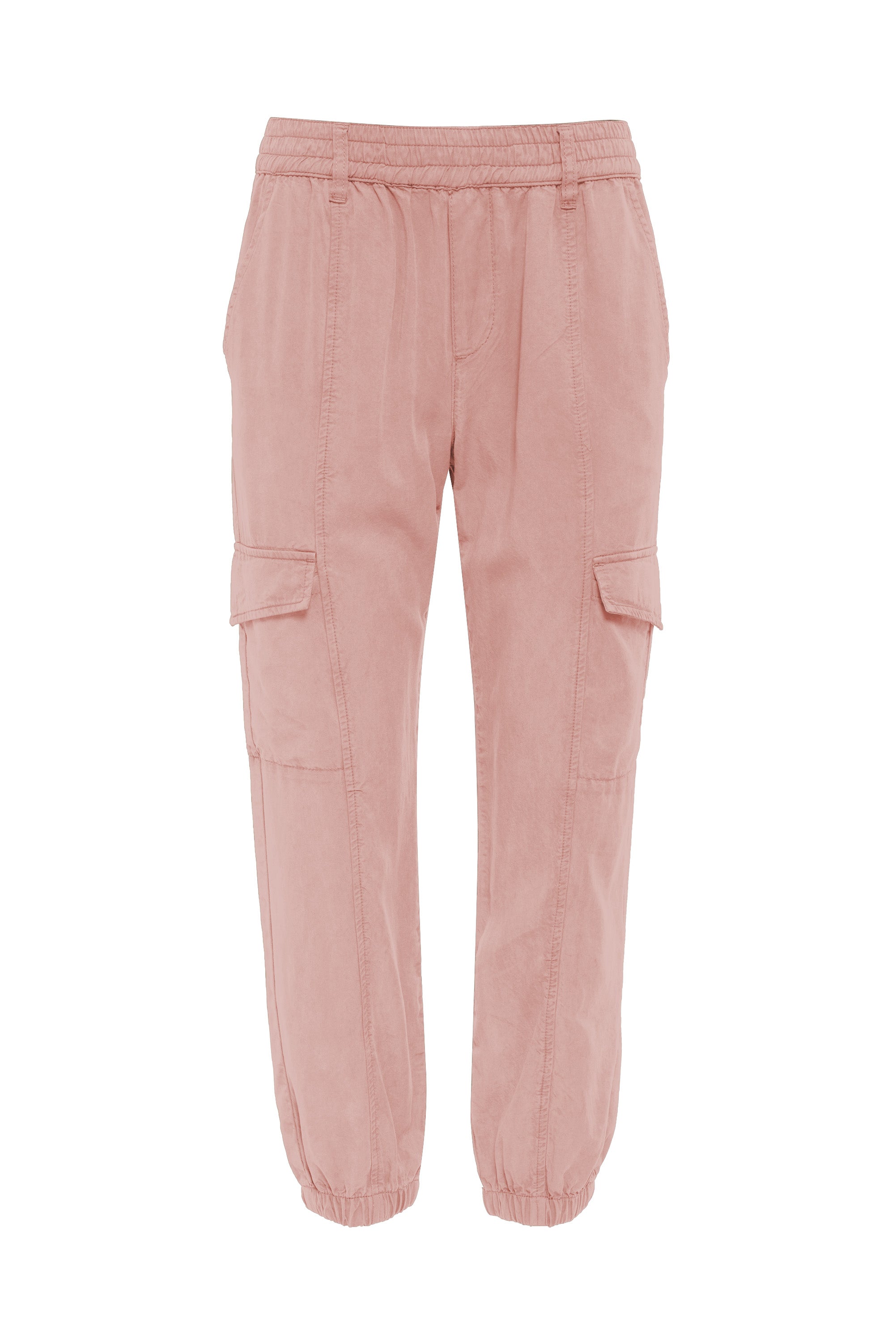 The Relaxed Rebel Smokey Rose Inclusive Collection from Sanctuary Clothing features a pair of light pink cargo pants with side pockets, an elastic waistband, and elastic cuffs at the ankles. The fabric appears to be soft, and the design is casual with a slightly relaxed fit.