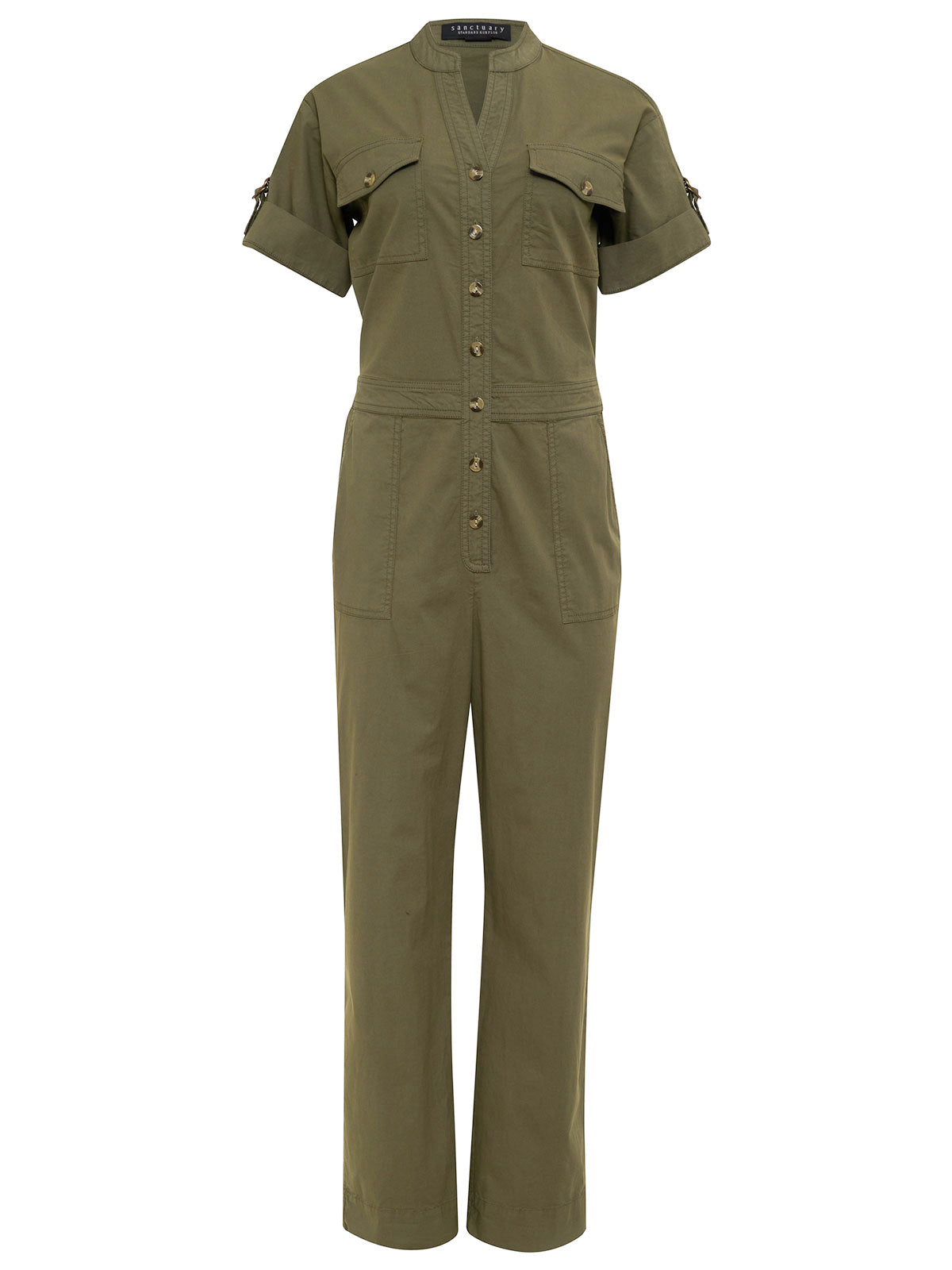 The Reserve Jumpsuit Burnt Olive by Sanctuary Clothing is a green, short-sleeved, button-up utility jumpsuit that features a V-neckline and rolled sleeves. It includes four front pockets, with two on the chest and two on the hips, as well as straight legs.