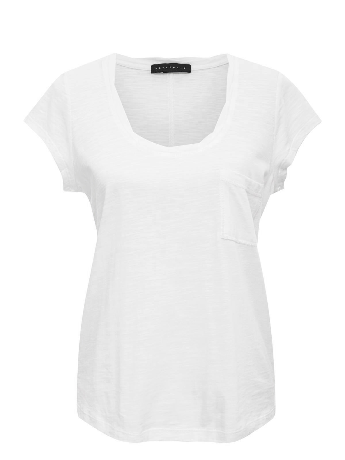 A plain white T-shirt from Sanctuary Clothing's Traveler Twist Tee White Inclusive Collection is displayed against a white background. The T-shirt features short sleeves, a scoop neck, and a small chest pocket on the left side. A black tag with text is attached at the inside of the neckline.