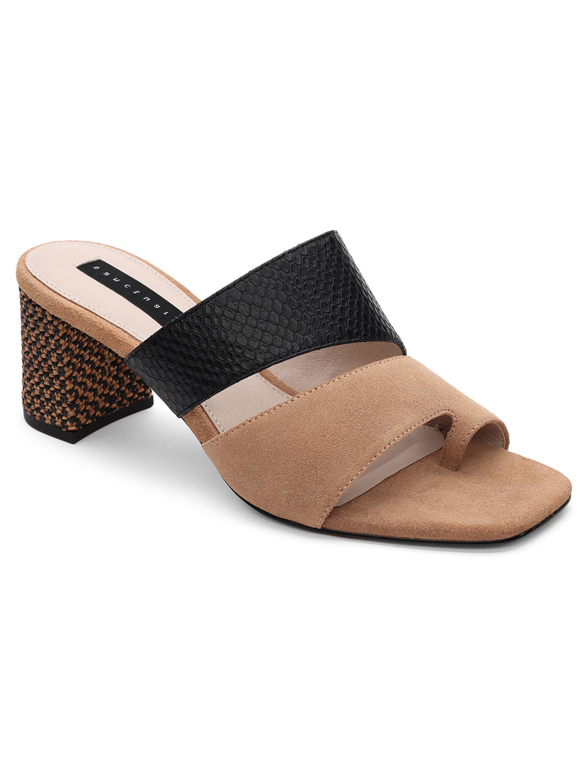 The Brisk Sandal Cafe Black by Sanctuary Clothing is a women's open-toe block heel sandal featuring a tan suede strap and a black textured strap across the top. The heel sports a checkered pattern in black and tan colors, while the insole is beige.