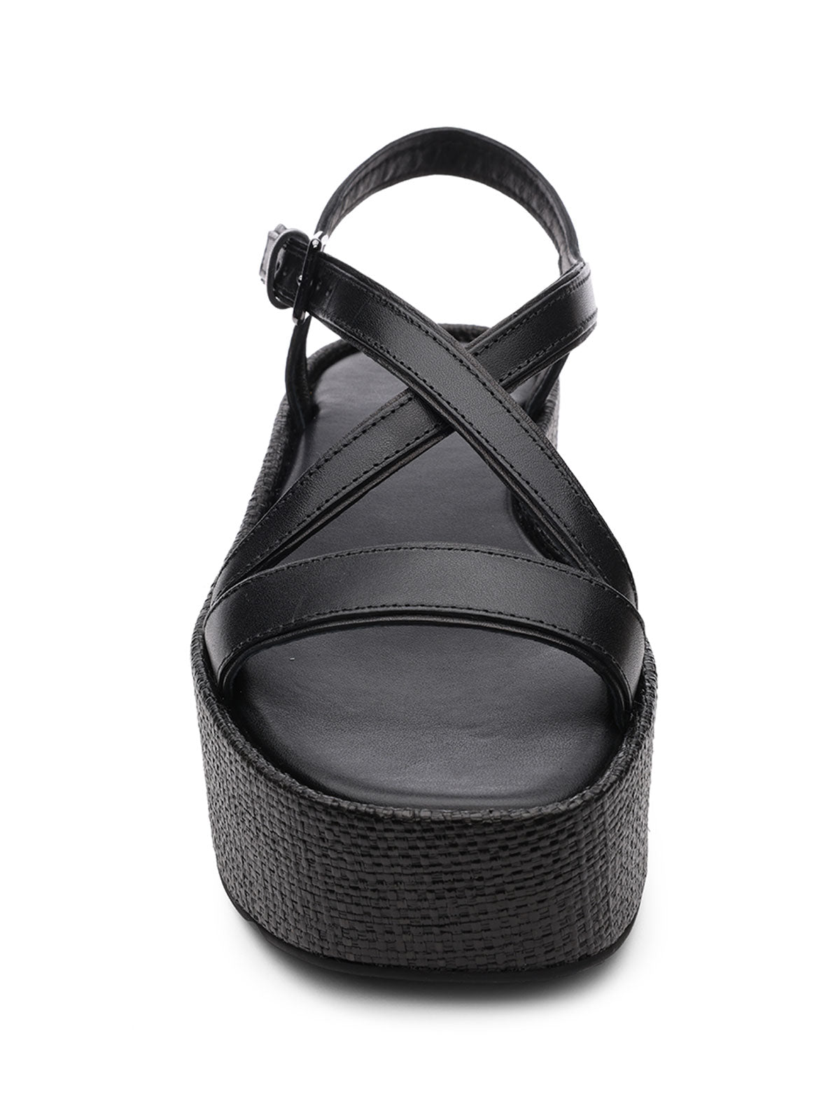 Introducing the Define Sandal Black Black by Sanctuary Clothing: This stylish sandal features a sleek, smooth appearance with two crisscrossing straps across the front and a single strap with an adjustable buckle around the ankle. The black platform sole adds height and includes a textured finish for added grip.