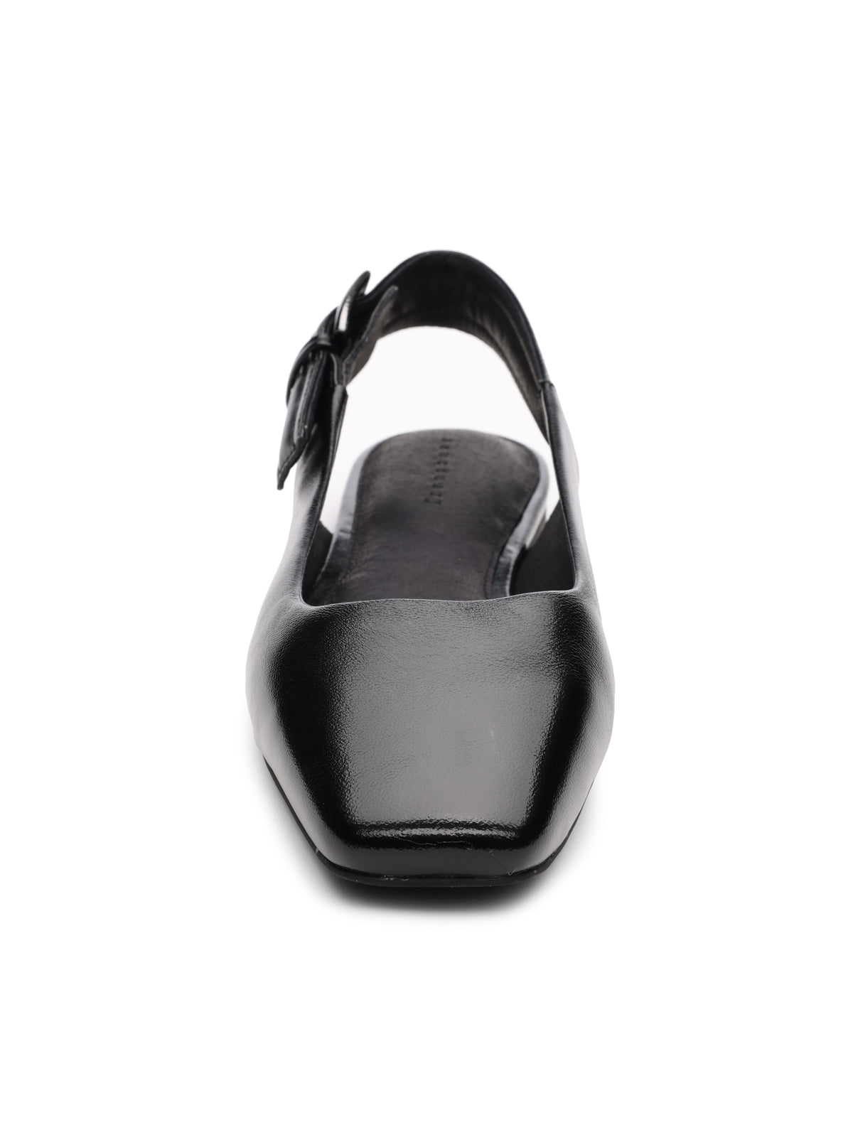 Front view of the Kitchy Slingback Flat Black by Sanctuary Clothing, a black leather slingback flat shoe with a square toe and an ankle strap featuring a small buckle. The cushioned insole ensures added comfort. The shoe is set against a plain white background.