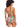 A woman with curly hair is seen from the back, wearing the "Super Bloom V Waist Bikini Bottom Multi" by Sanctuary Clothing. The strapless bikini showcases a vibrant floral pattern in shades of pink, yellow, and green and is tied at the back. She stands against a plain white background.