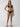 A person confidently poses against a plain background wearing the Sea Crochet Halter Tall Tri Bikini Top in black by Sanctuary Clothing, their long hair down. They stand straight with their hands by their sides and are paired with white slide sandals.