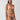 A person with long hair is wearing the Sanctuary Clothing "Sol Searcher OTS Underwire Bikini Top" in white sand, featuring an orange and white swirl pattern. They are standing in front of a plain gray background, maintaining a neutral expression while looking toward the camera.